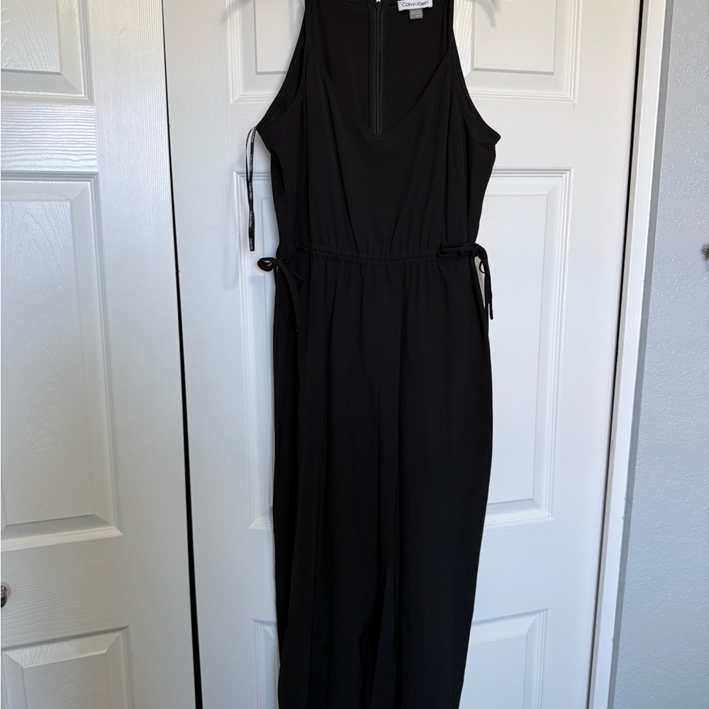 Black Sleeveless Jumpsuit with pockets. NWOT